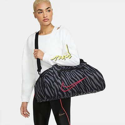 Nike Gym Club Women's Printed Training Duffel Bag In Black/fireberry