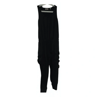 Pre-owned Dkny Jumpsuit In Black