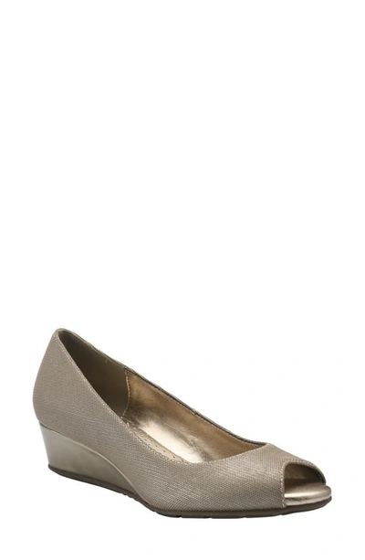 Bandolino Peep Toe Wedge Pump In Gold Glam Fabric