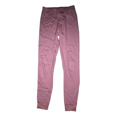 Pre-owned Helly Hansen Pink Synthetic Trousers