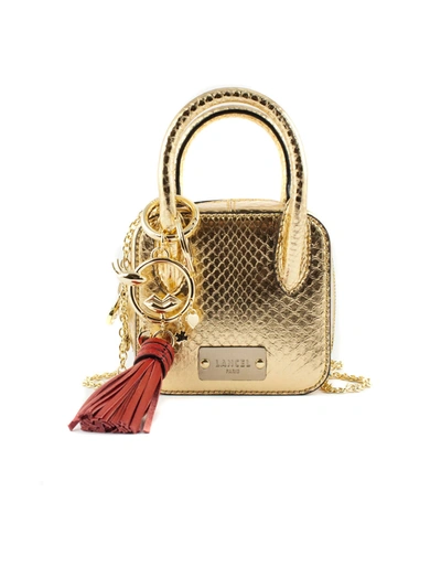 Lancel Gold-tone Leather Handbag In Oro
