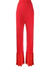 Stella Mccartney Fluted Ribbed Organic Cotton-blend Flared Pants In Red