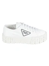 PRADA EMBOSSED LOGO SNEAKERS,11749234