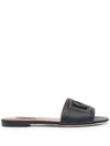Dolce & Gabbana Black Leather Mules With Dg Logo In Black