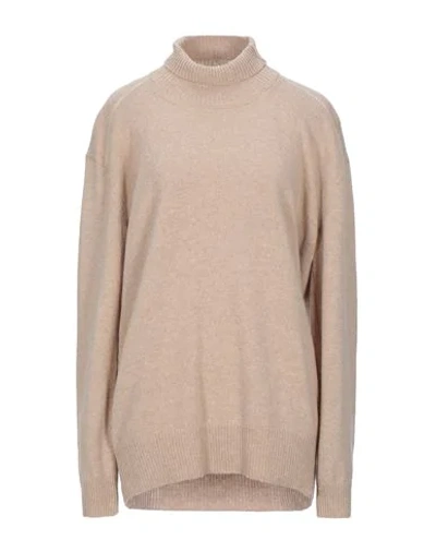 Celine Turtlenecks In Beige