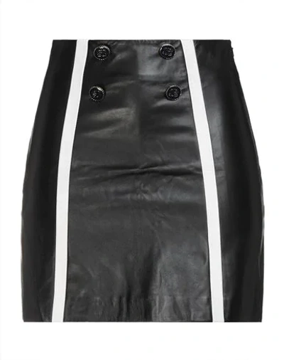 Sandro Mini Skirts In Black