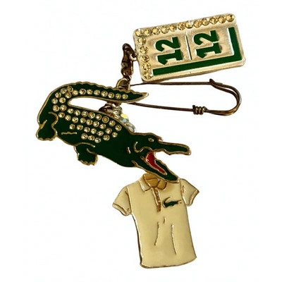 Pre-owned Lacoste Pin & Brooche In Silver
