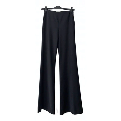 Pre-owned Valentino Wool Trousers In Black