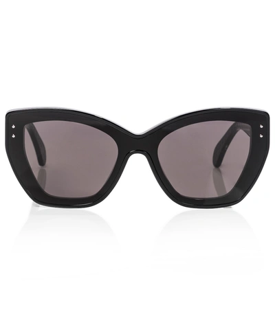 Alaïa Thick Round Acetate Sunglasses In Shiny Black