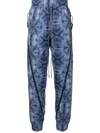 Mostly Heard Rarely Seen Kaleidoscope Zipped Jogging Trousers In Blue