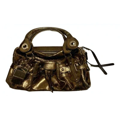Pre-owned Alessandro Dell'acqua Leather Handbag In Gold