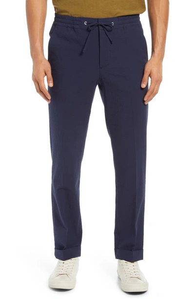Nn07 Sebastian Tapered Cotton-blend Seersucker Drawstring Trousers In Navy Blue