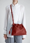 Loewe Flamenco Drawstring Knot Clutch Bag In Brick