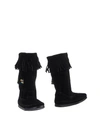 Minnetonka Layered Fringe Suede Boots In Black