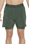 Nike Dry-fit 2-in-1 Pocket Yoga Shorts In Galactic Jade