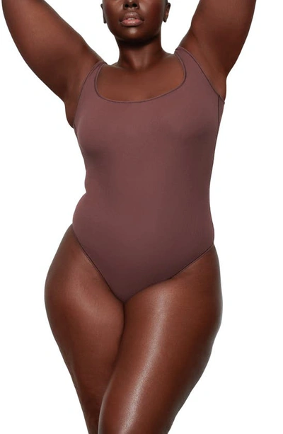 Skims Ribbed Stretch Cotton Bodysuit In Garnet