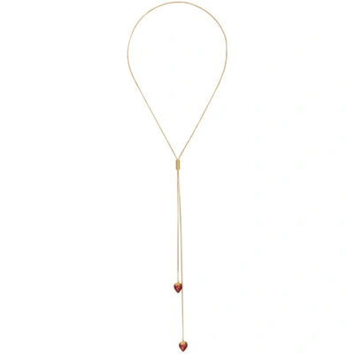 Saint Laurent Gold Strawberry Bolo Necklace In 9178 Aged Gold/red