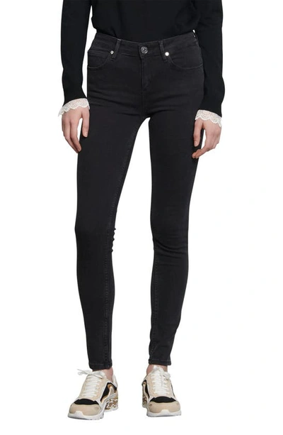 Sandro Pam Mid-rise Skinny Jeans In Black