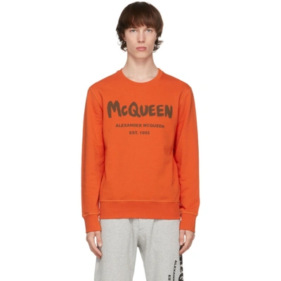 Alexander Mcqueen Graffiti Print Logo Sweatshirt In Orange