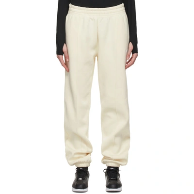 Nike Yellow Fleece Sportswear Essential Lounge Pants In Sanddrift/ White