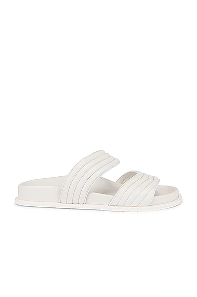 Alaïa Leather Slides In Blanc Casse