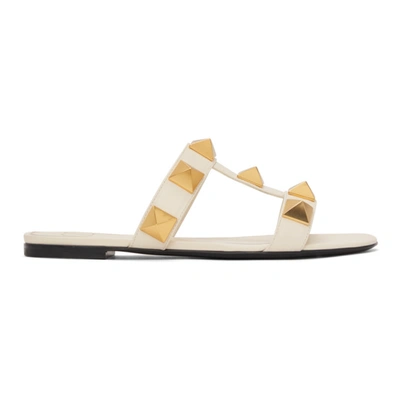 Valentino Garavani Roman Stud Flat Sandals With Signature Pyramid Studs In White