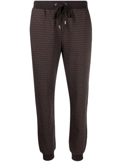 Michael Michael Kors Monogram-print Track Trousers In Braun