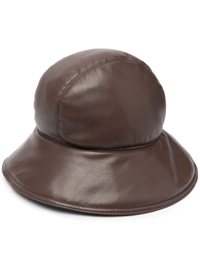 Nanushka Curved-brim Vegan Leather Bucket Hat In Brown