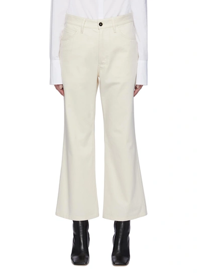 Jil Sander High-rise Cotton Bootcut Trousers In Beige
