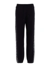 Msgm Embroidered Cotton-blend Fleece Track Pants In Black