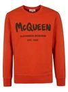 Alexander Mcqueen Graffiti Print Logo Sweatshirt In Orange/khaki