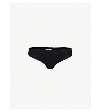 CALVIN KLEIN WOMENS BLACK INVISIBLES JERSEY THONG,97848271