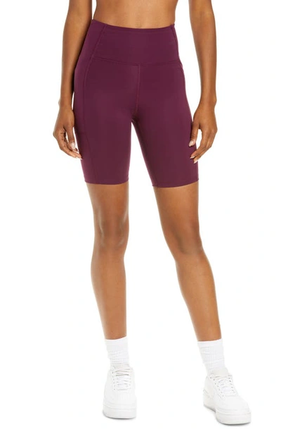 Girlfriend Collective High Rise Pocket Bike Shorts In Plum