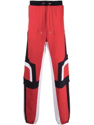 Balmain Tapered Panelled Cotton-jersey Sweatpants In Red