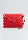 Valentino Garavani Rockstud V-flap Pouch Clutch Bag In Red