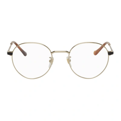 Gucci Gold Round Glasses In 005 Gold