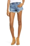 Free People Loving Good Vibrations Cotton Frayed Denim Shorts In Mid Indigo