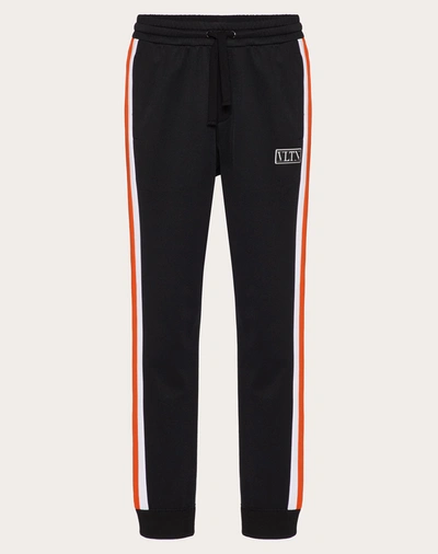 Valentino Uomo Technical Cotton Trousers With Vltn Tag Colour Block In Black/neon Orange