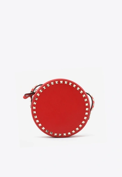 Valentino Garavani Rockstud Round Crossbody Bag In Calfskin In Red