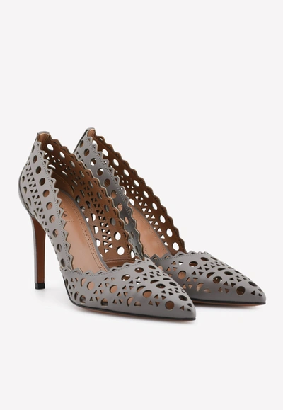 Alaïa 'vienne' 90 Cut-out Pointed Pumps In Calfskin In Grey