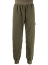 Undercover Cropped Track Pants In Grün