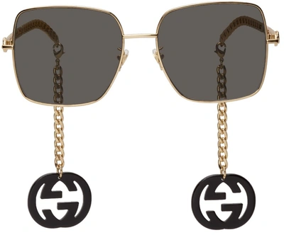 Gucci Black & Gold Chain Runway Sunglasses In 001 Gold