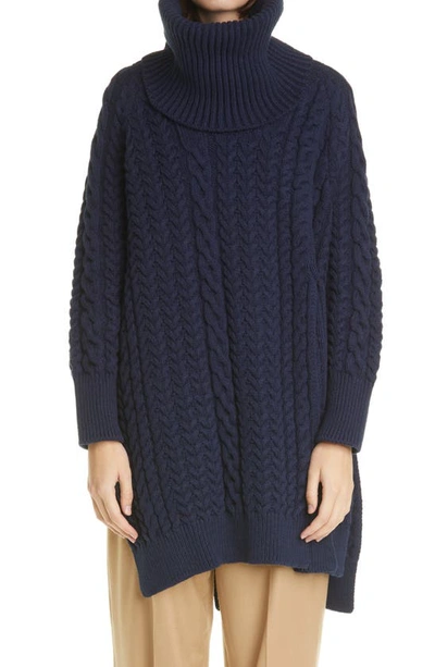 Stella Mccartney + Net Sustain Oversized Asymmetric Cable-knit Organic Cotton-blend Turtleneck Cape In Blue