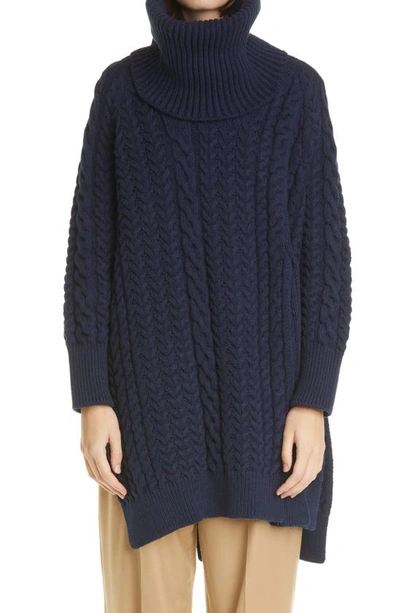 Stella Mccartney + Net Sustain Oversized Asymmetric Cable-knit Organic Cotton-blend Turtleneck Cape In Ink