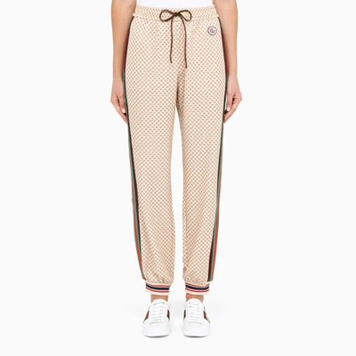 Gucci Interlocking G Print Jersey Trousers In Neutrals