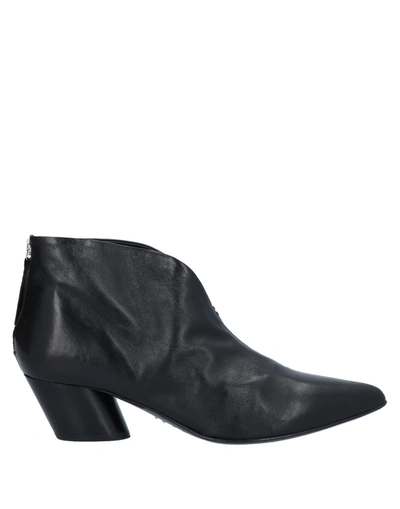 Halmanera Ankle Boots In Black