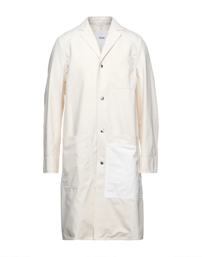 Oamc Overcoats In Beige