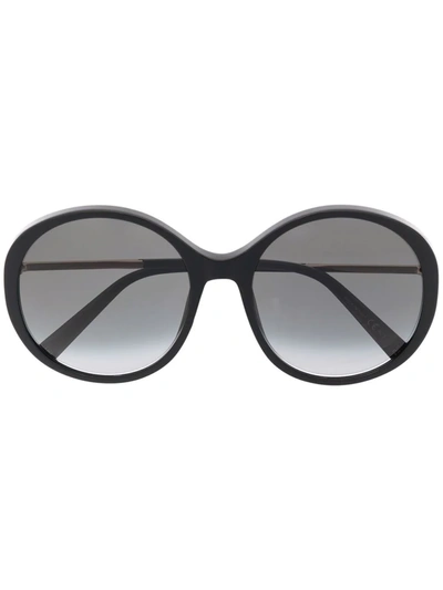 Givenchy 有色镜片圆框太阳眼镜 In Schwarz