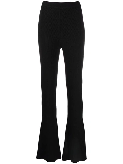 Aeron Ribbed-knit Flared Trousers In Black