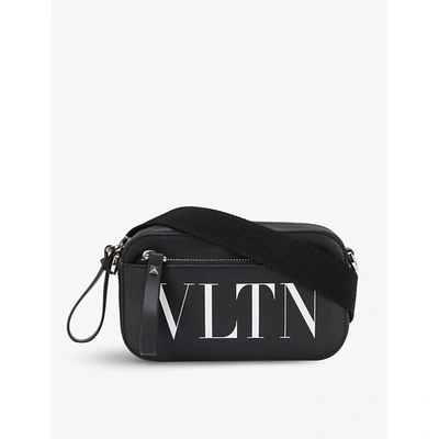 Valentino Garavani Vltn-print Zipped Small Leather Cross-body Bag In Nero/bianco